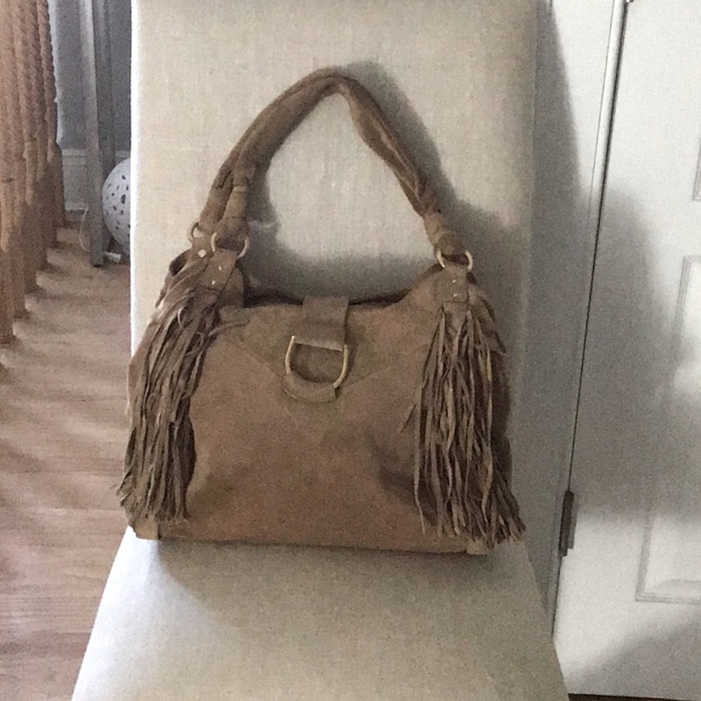 Women’s s suede fringe bag.